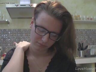 Solo lover with glasses chatting in the kitchen